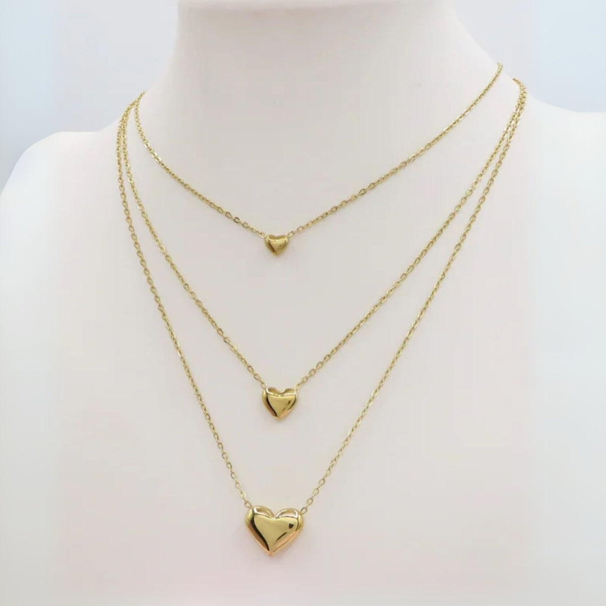 Collana 3 cuori in acciaio color oro con scatola cuore