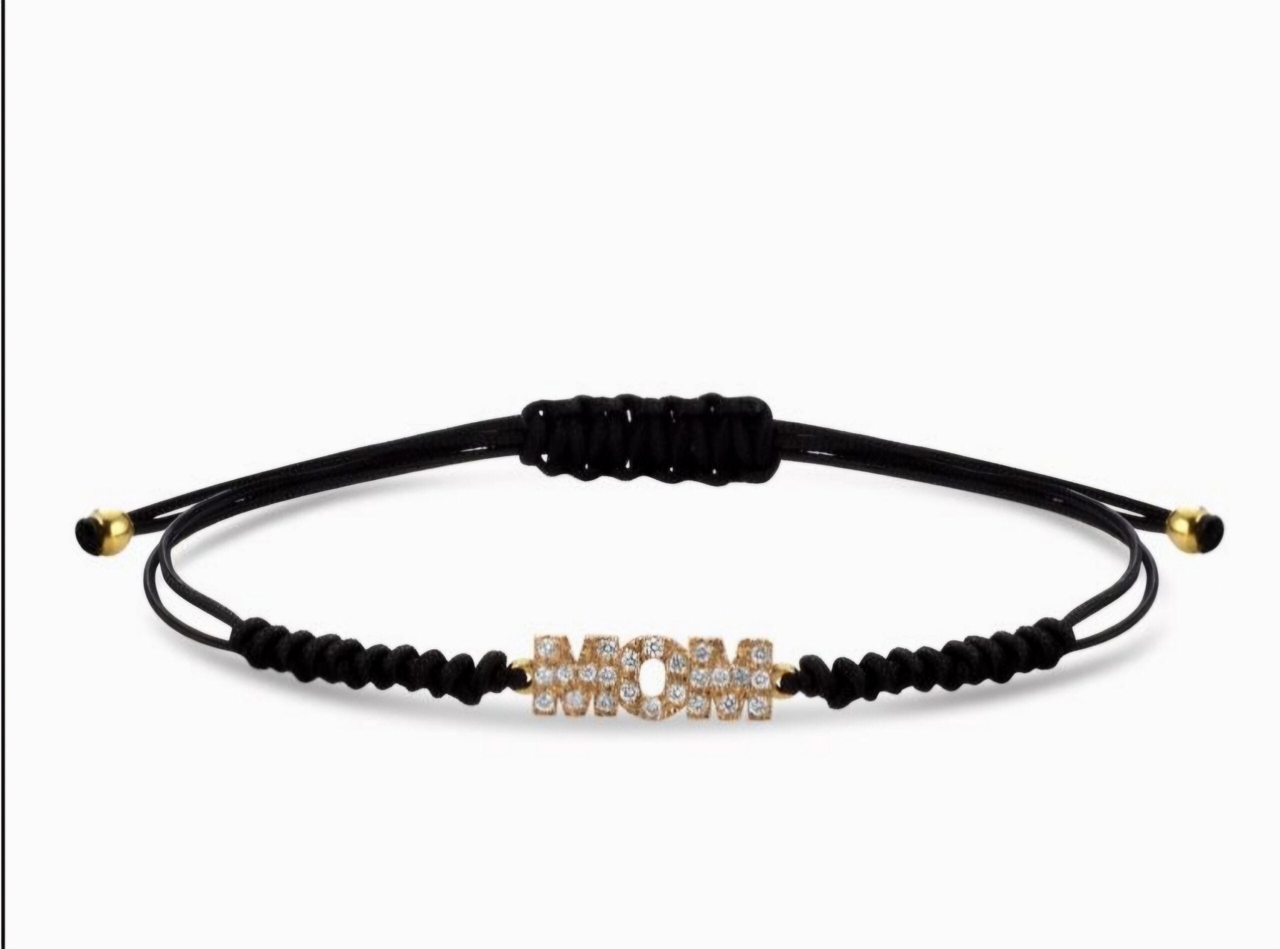 Bracciale oro 18kt ,diamanti e caucciu' con scritta "mamma "