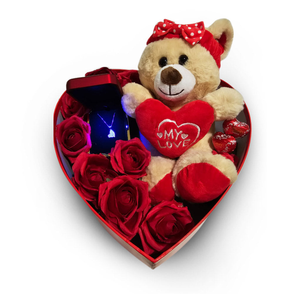 Confezione regalo a forma di cuore con orsetto di peluches
